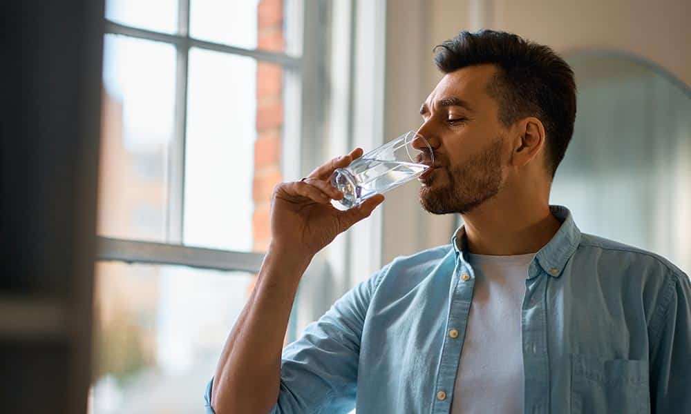 Being well hydrated is necessary for maintaining proper kidney health and functioning, but simply drinking more water will not change the half-life of Vyvanse